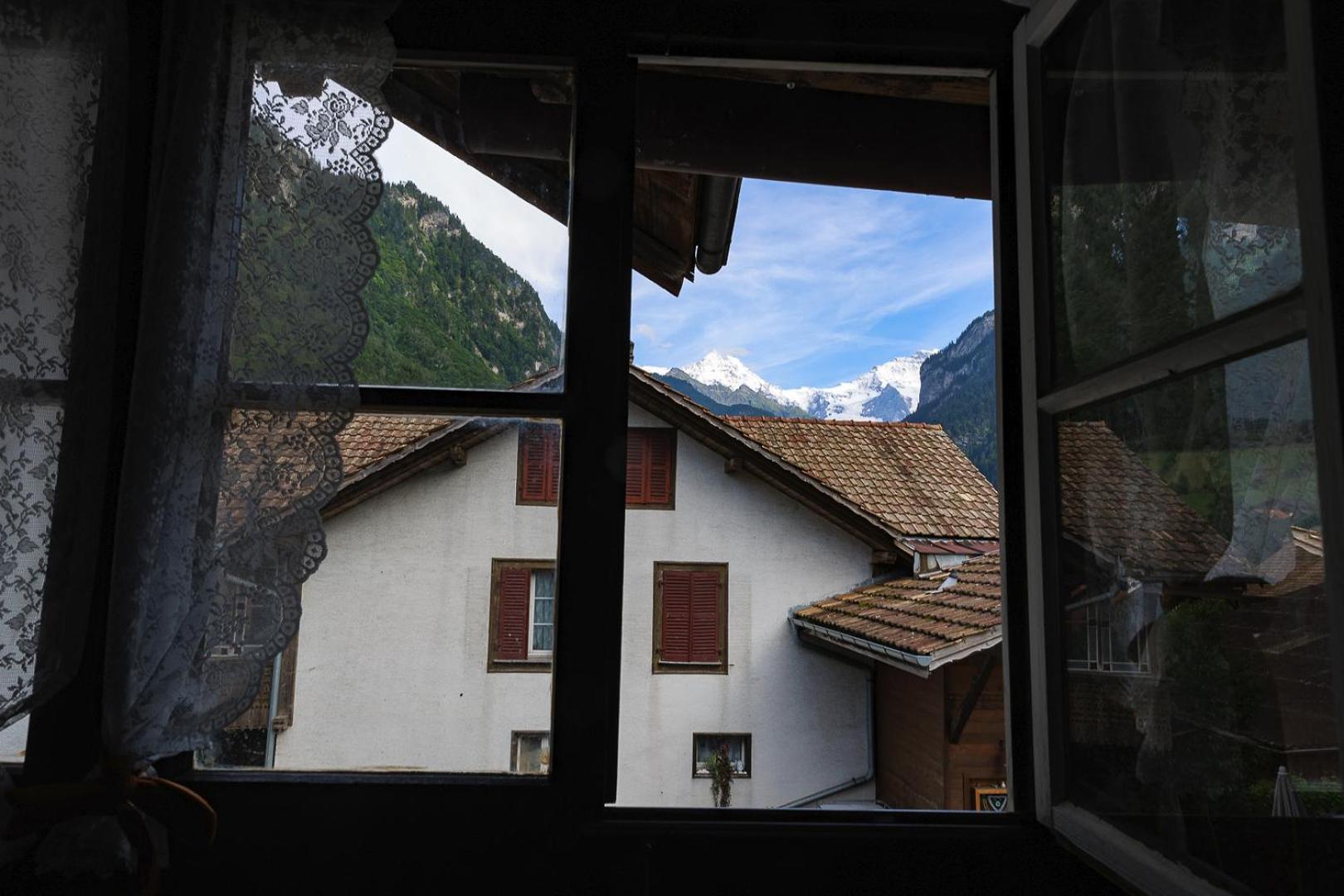 Charming Alpine Retreat By Apartments Capricorn Gsteigwiler Esterno foto